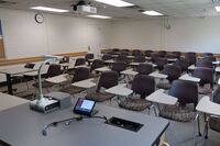 Back of room view of student tablet arm seating