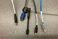 Pedestal - laptop cable connections with cables pulled out showing cable ends