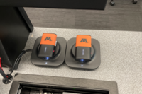 Pedestal - inside view of drawer showing two wireless mics in charging base