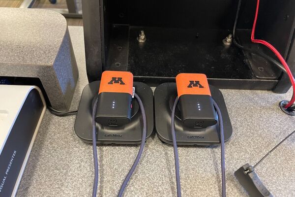 Pedestal - microphones charging on pedestal surface 