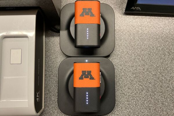 Pedestal - microphones charging on pedestal surface 
