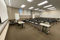 Back of room view of student tablet arm seating 