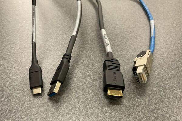 Pedestal - laptop cable connections with cables pulled out showing cable ends