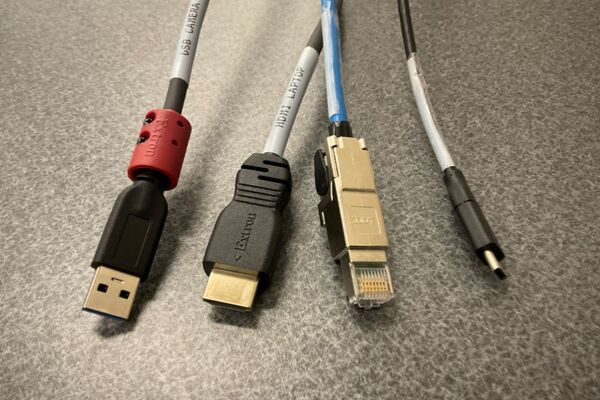 Pedestal - laptop cable connections with cables pulled out showing cable ends
