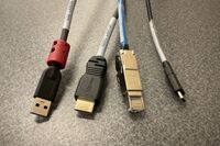 Pedestal - laptop cable connections with cables pulled out showing cable ends
