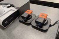 Microphones on top of instructor pedestal with charging base