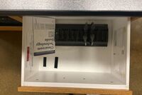 Assisted listening devices charging inside drawer