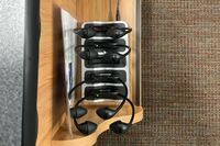 Assisted listening devices charging inside drawer