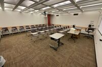 Back of room view of student tablet arm seating 