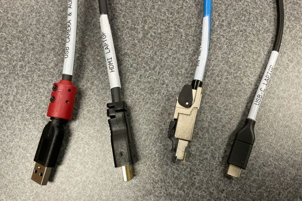 Pedestal - laptop cable connections with cables pulled out showing cable ends