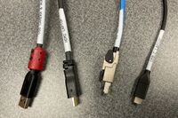 Pedestal - laptop cable connections with cables pulled out showing cable ends