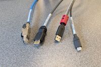 Pedestal - laptop cable connections with cables pulled out showing cable ends
