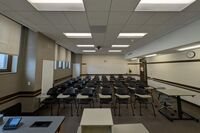 Back of room view of student tablet arm seating 