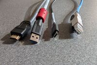Pedestal - laptop cable connections with cables pulled out showing cable ends