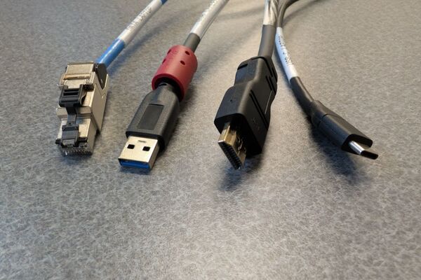 Pedestal - laptop cable connections with cables pulled out showing cable ends