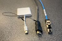 Pedestal - laptop cable connections with cables pulled out showing cable ends