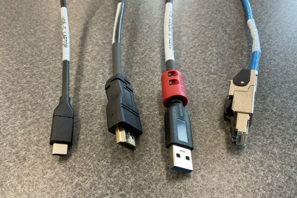 Pedestal - laptop cable connections with cables pulled out showing cable ends