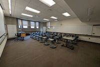 Back of room view of student tablet arm seating 