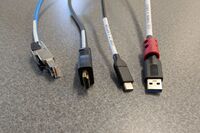 Pedestal - laptop cable connections with cables pulled out showing cable ends