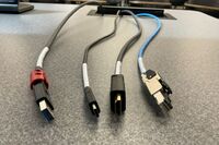 Pedestal - laptop cable connections with cables pulled out showing cable ends