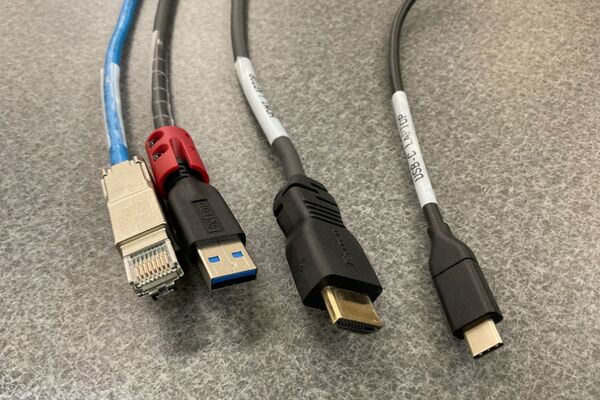 Pedestal - laptop cable connections with cables pulled out showing cable ends