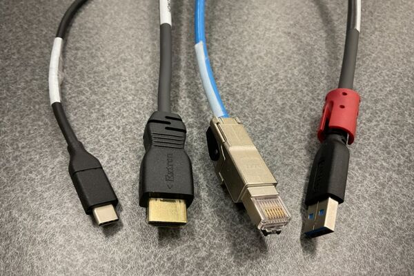 Pedestal - laptop cable connections with cables pulled out showing cable ends