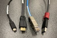 Pedestal - laptop cable connections with cables pulled out showing cable ends