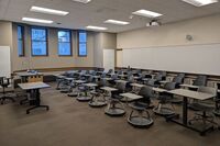 Back of room view of student tablet arm seating 