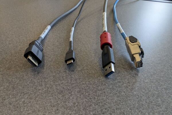 Pedestal - laptop cable connections with cables pulled out showing cable ends