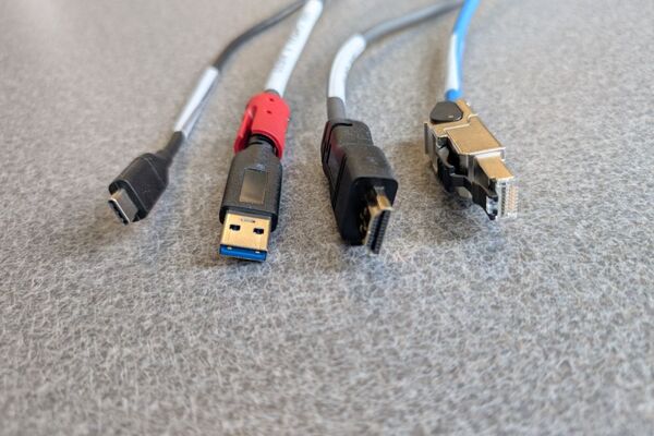 Pedestal - laptop cable connections with cables pulled out showing cable ends