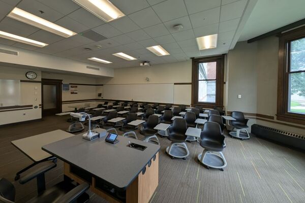 Back of room view of student tablet arm seating 