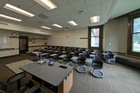 Back of room view of student tablet arm seating 