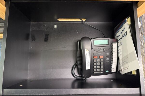 Pedestal - inside view of drawer showing telephone