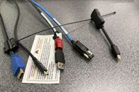 Pedestal - laptop cable connections with cables pulled out showing cable ends
