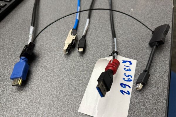 Pedestal - laptop cable connections with cables pulled out showing cable ends