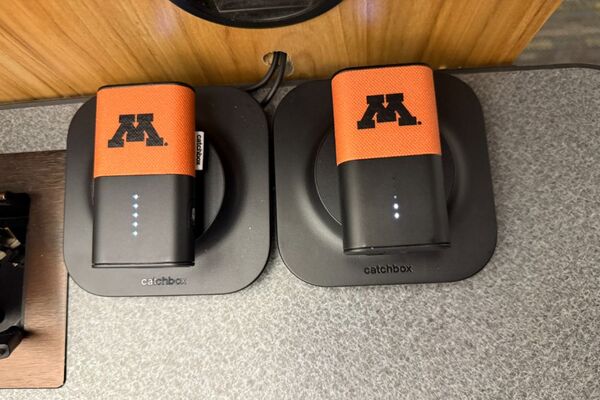 Pedestal - view showing two wireless mics in charging base