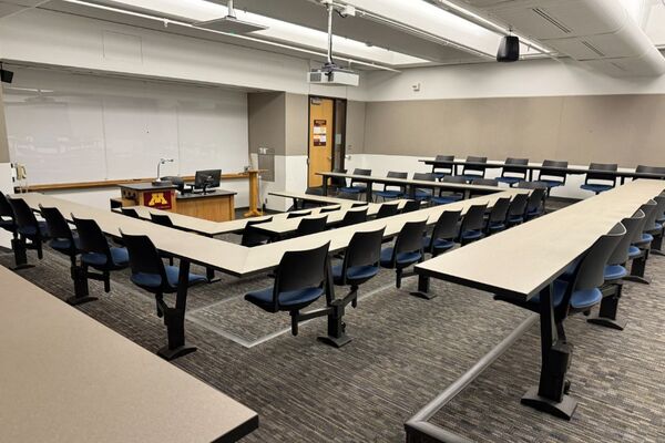 Front of room view with lectern center in front of markerboard 