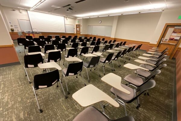  Front of room view with lectern on left in front of markerboard