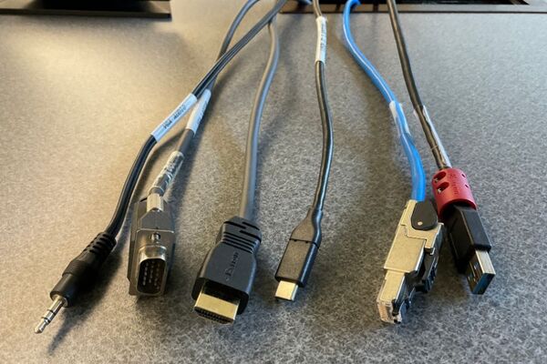 Pedestal - laptop cable connections with cables pulled out showing cable ends