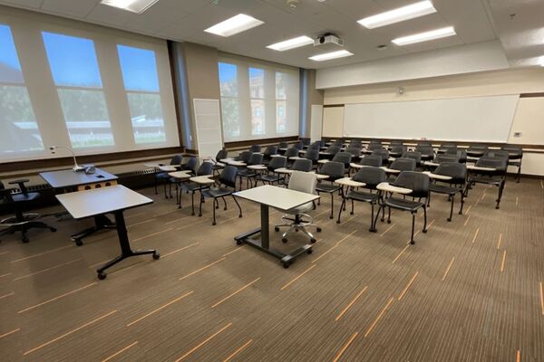 Back of room view of tables and chairs