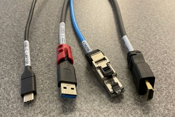 Pedestal - laptop cable connections with cables pulled out showing cable ends