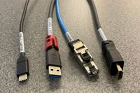 Pedestal - laptop cable connections with cables pulled out showing cable ends
