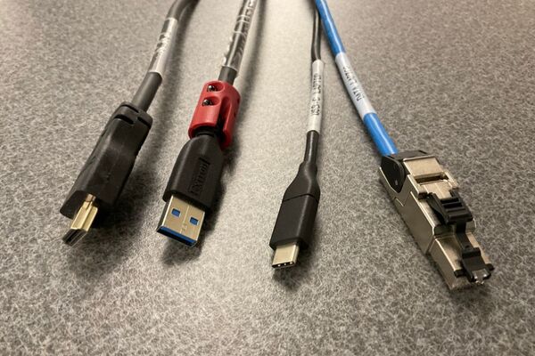 Pedestal - laptop cable connections with cables pulled out showing cable ends