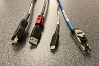 Pedestal - laptop cable connections with cables pulled out showing cable ends