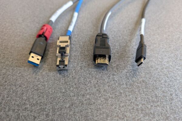 Pedestal - laptop cable connections with cables pulled out showing cable ends