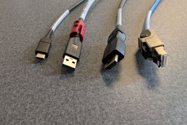 Pedestal - laptop cable connections with cables pulled out showing cable ends