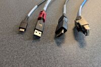 Pedestal - laptop cable connections with cables pulled out showing cable ends