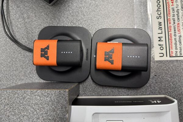 Microphones charging on pedestal surface