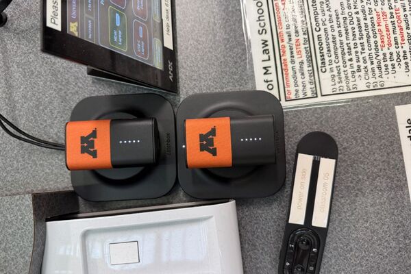 Microphones charging on pedestal surface