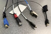 Pedestal - laptop cable connections with cables pulled out showing cable ends